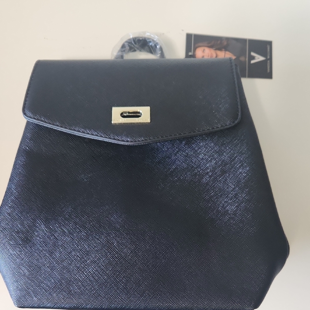 Sleek Black Backpack with Gold Hardware